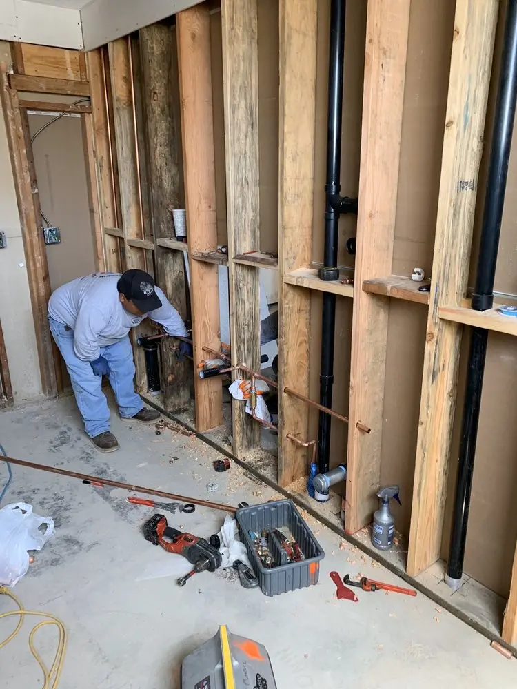 Commercial rough-in plumbing for Water Heater Replacement in Olivette